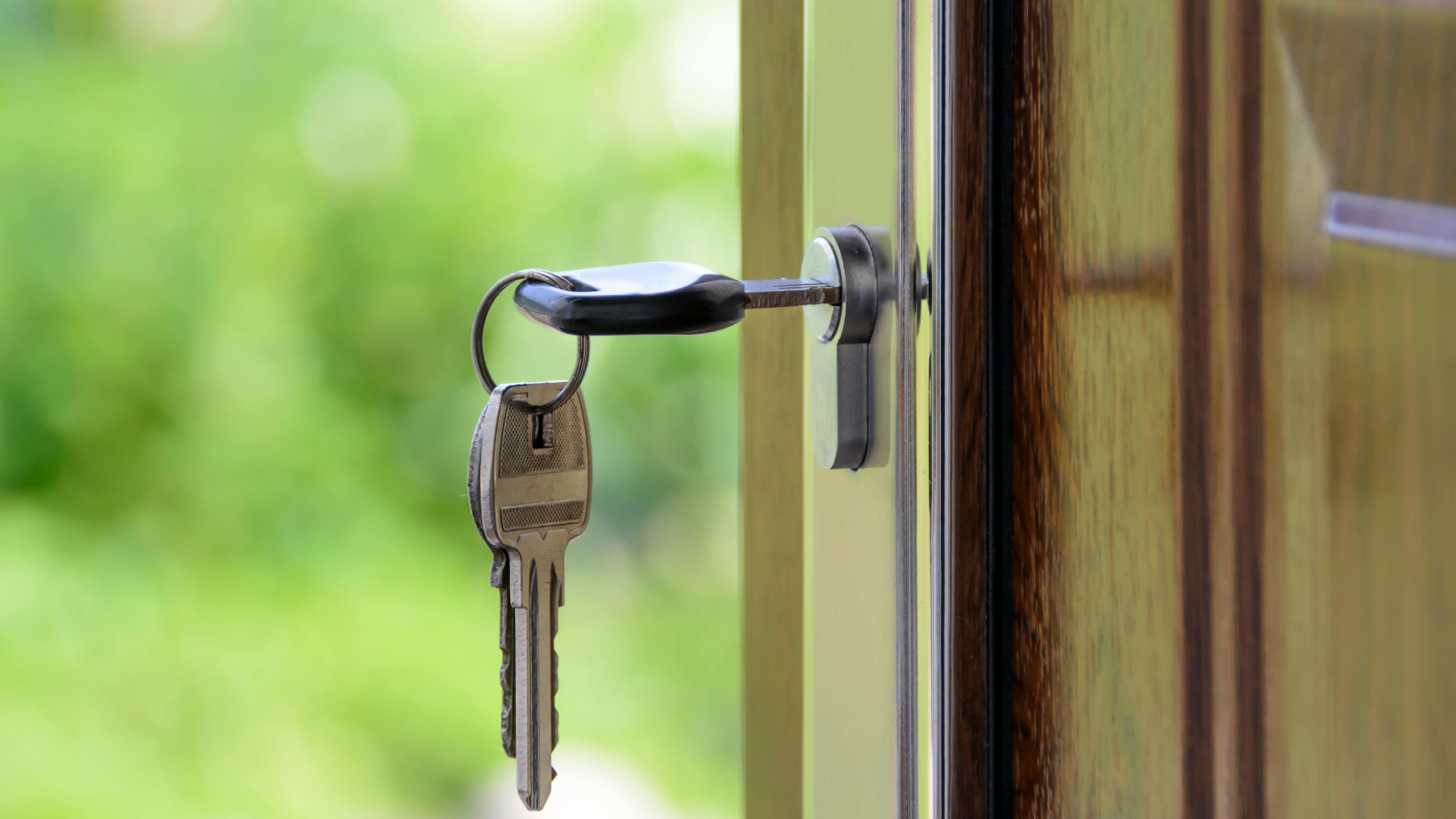 Key in lock of open door